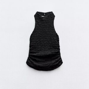 Zara Black textured halter neck top, button closure around the neck. Size small.